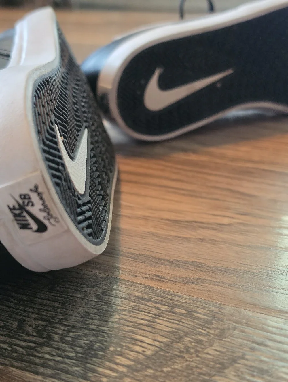 Nike SB Black Low-Top Sneakers with White Swoosh